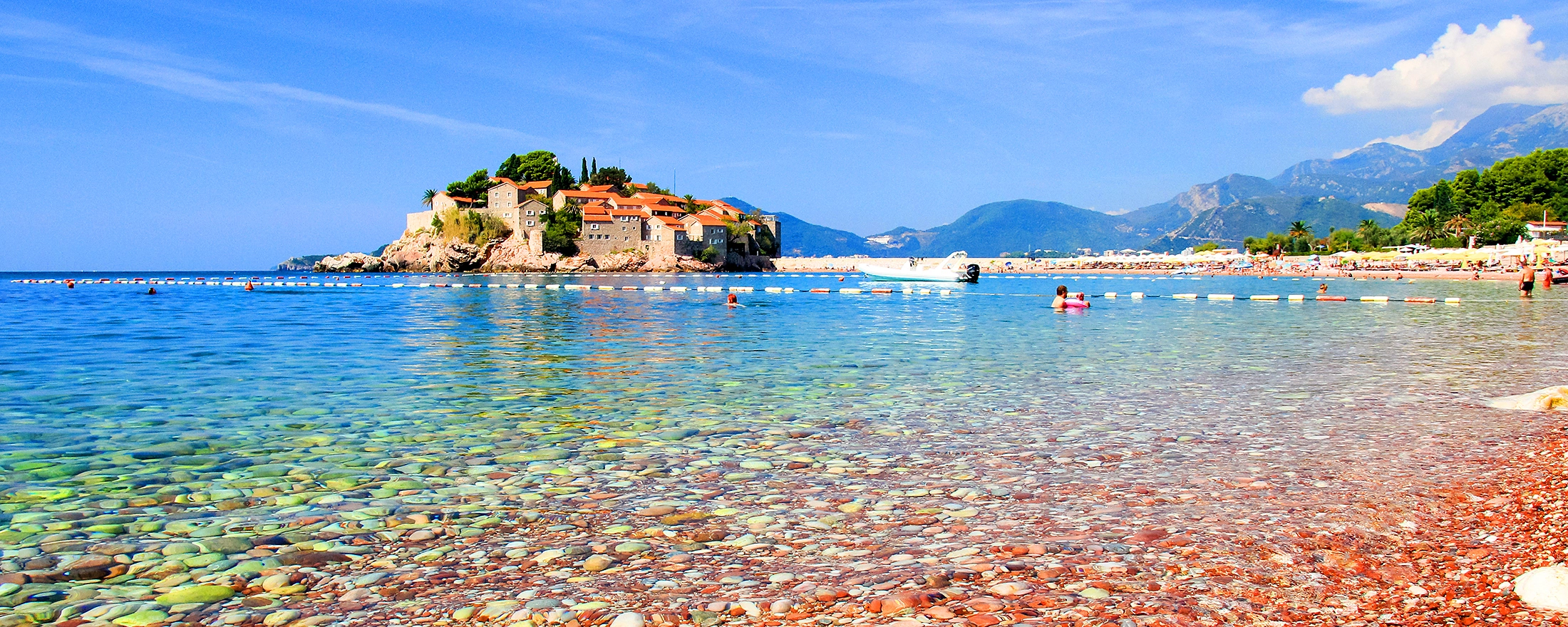 HERO_Sveti-Stefan-beach-and-island-on-the-Adriatic-sea-Montenegro_Credit_GettyImages-649782836-1